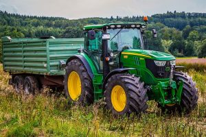 Image of green tractor in the field