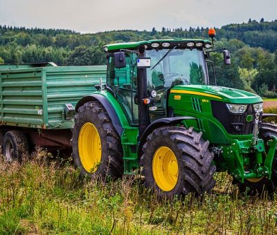 Image of green tractor in the field