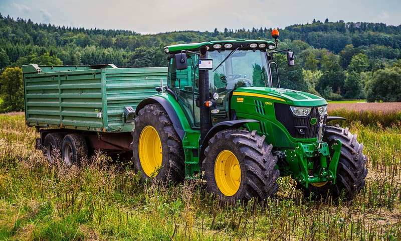 Image of green tractor in the field